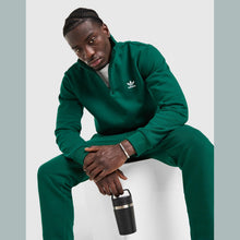Trefoil Essentials 1/4 Zip Sweatshirt Image 1 - LUZACTIVE - AUSTRALIA